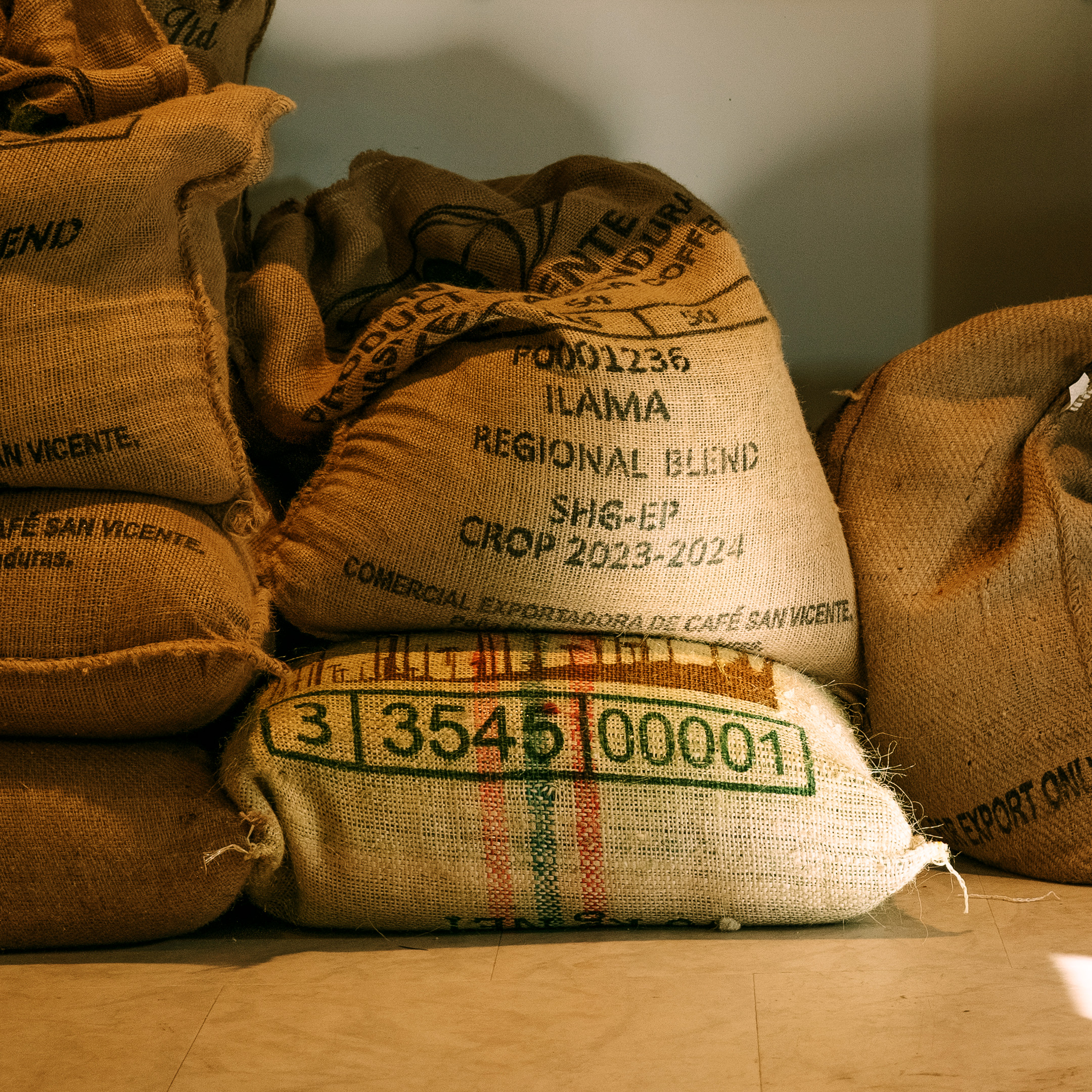 Sacks of green coffee at the Peoples Coffee roastery